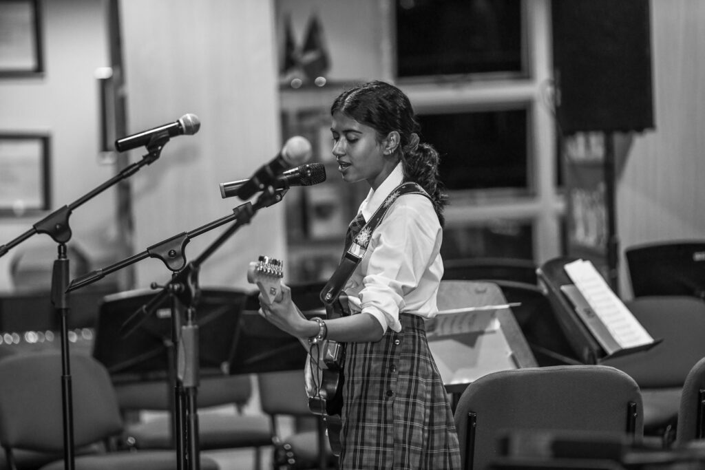 Peponi School pupil performing in the end of year music concert
